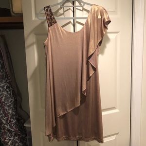 gold shimmer dress with leopard sequin on sleeve